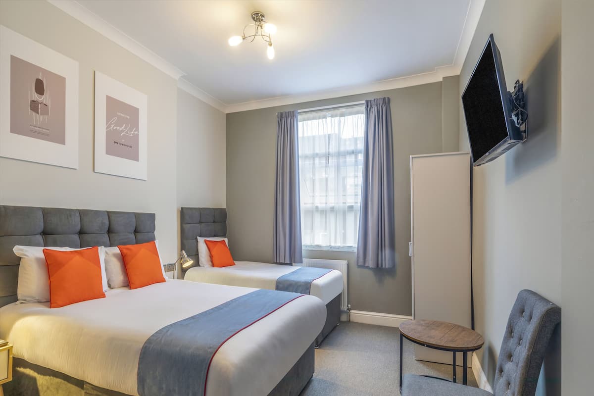 Chambre triple Deluxe | Accès au Wi-Fi (inclus), literie fournie