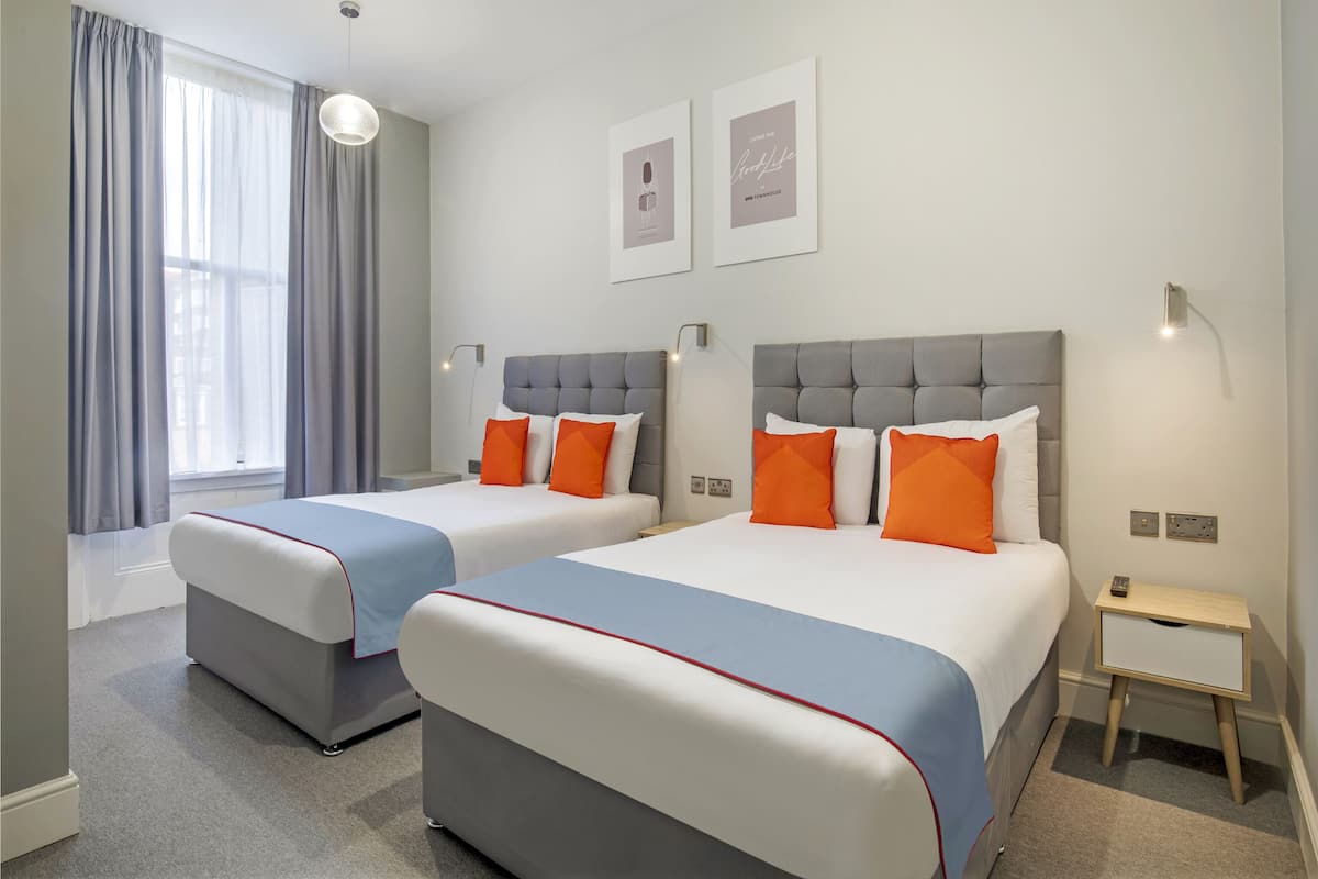 Chambre quadruple Standard | Accès au Wi-Fi (inclus), literie fournie