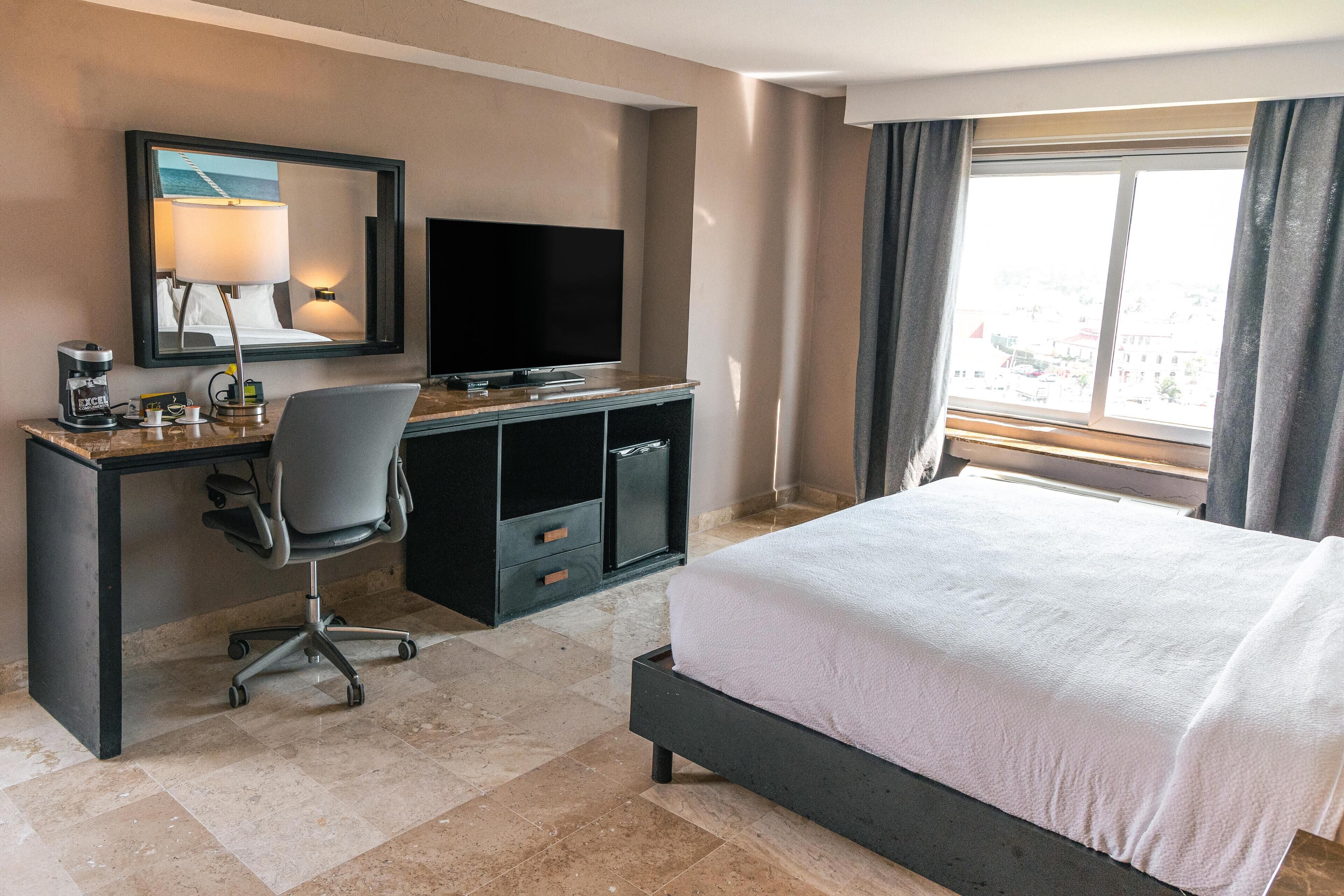 Suite, 1 King Bed, Balcony, City View | Premium bedding, in-room safe, desk, free WiFi