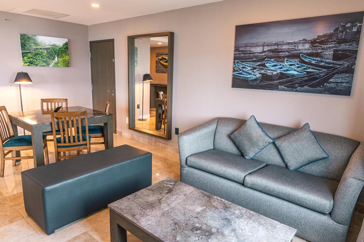 Suite, 1 King Bed, Balcony, Ocean View (Master) | Living area | LCD TV, MP3 dock