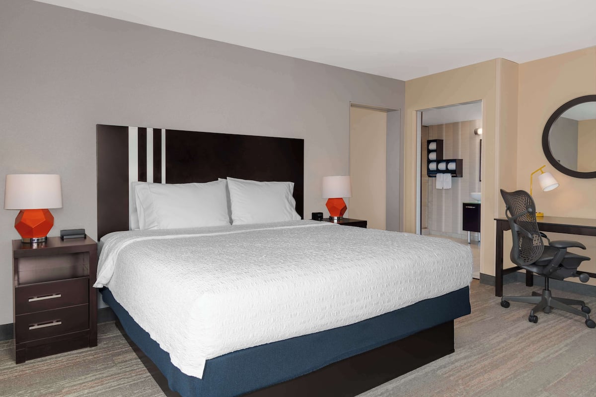 Hypo-allergenic bedding, down comforters, desk, laptop workspace