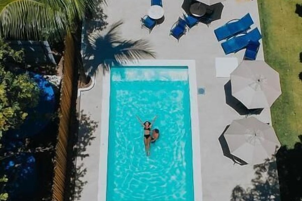 Outdoor pool, pool umbrellas, sun loungers