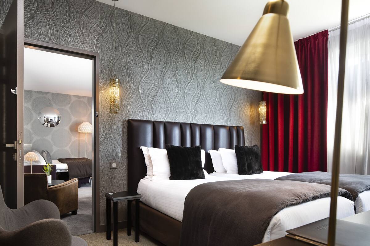 Luxe beddengoed, pillowtop-bedden, een kluis op de kamer, een bureau