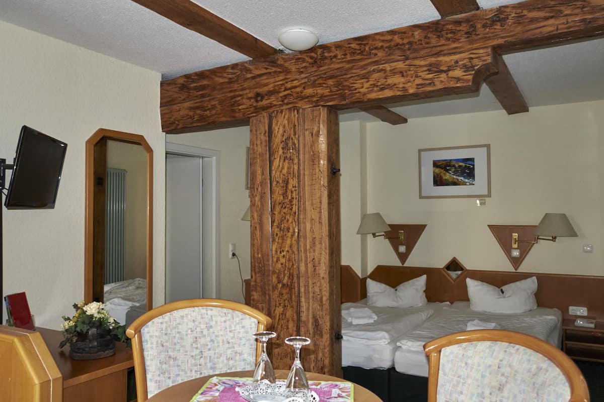 family room | 1 bedroom, premium bedding, in-room safe, desk