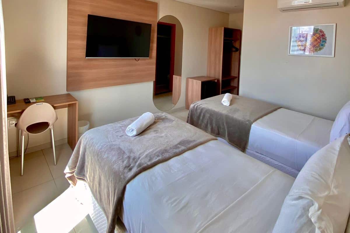 Minibar, desk, blackout curtains, iron/ironing board