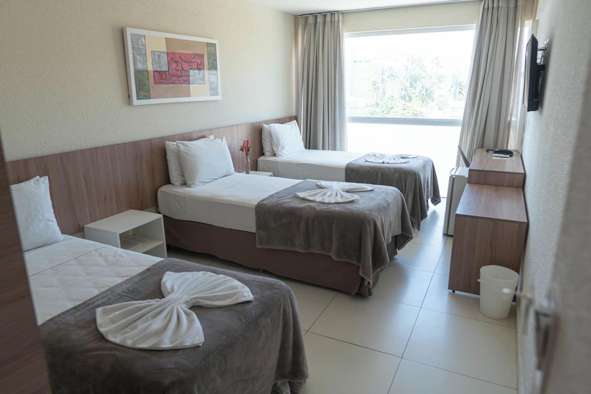 Minibar, desk, blackout curtains, iron/ironing board