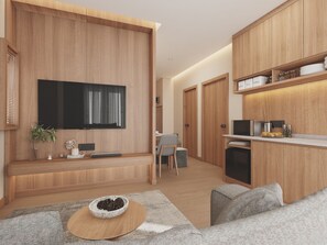 A modern kitchen with wooden cabinets, a built-in microwave, and a coffee station. - Victoria Nimman Hotel (Chiang Mai)