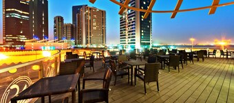 Magnum Hotel & Suites West Bay