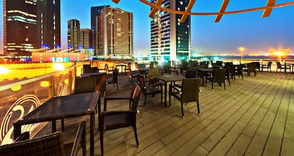 Magnum Hotel & Suites West Bay