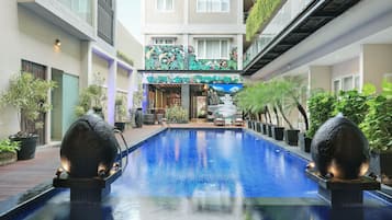 Outdoor pool, sun loungers