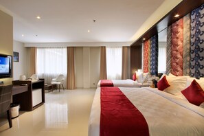 Family Suite | Premium bedding, minibar, in-room safe, desk - Ohana Hotel Kuta (Kuta)