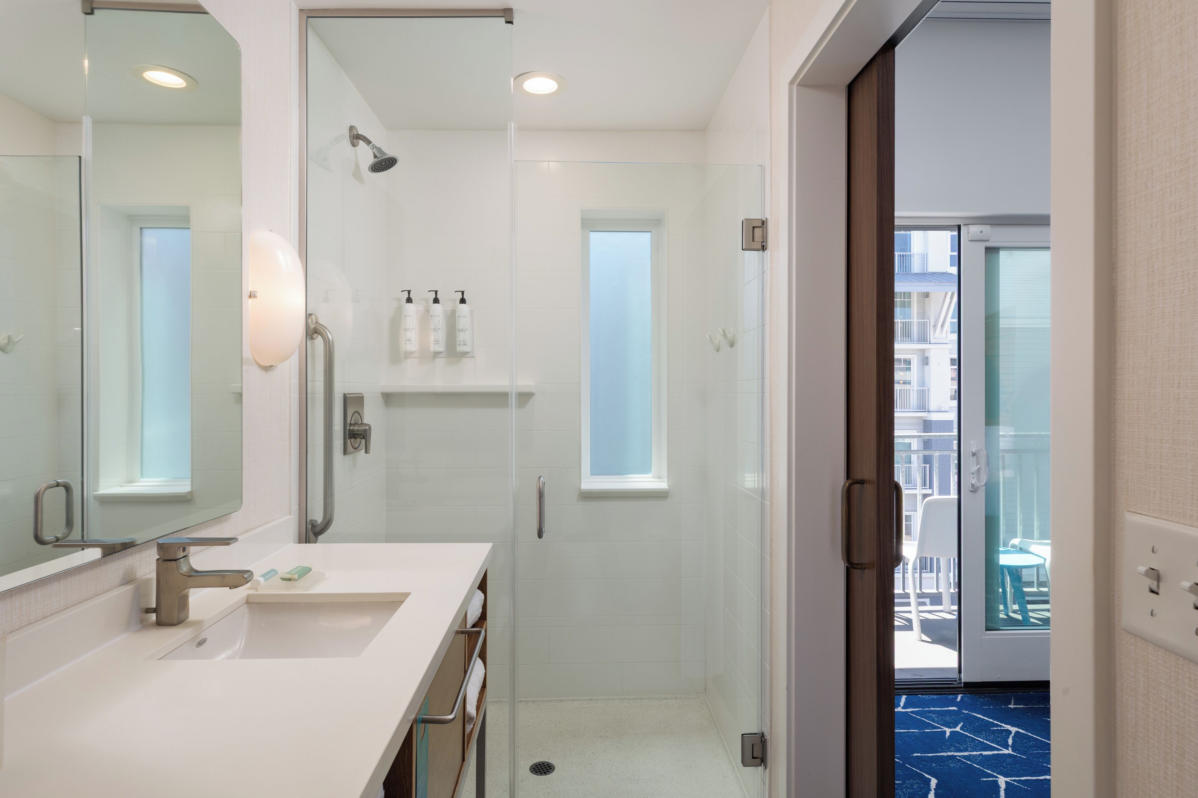 room, 1 king bed with sofa bed (hearing accessible) | bathroom | eco-friendly toiletries, hair dryer, towels, soap