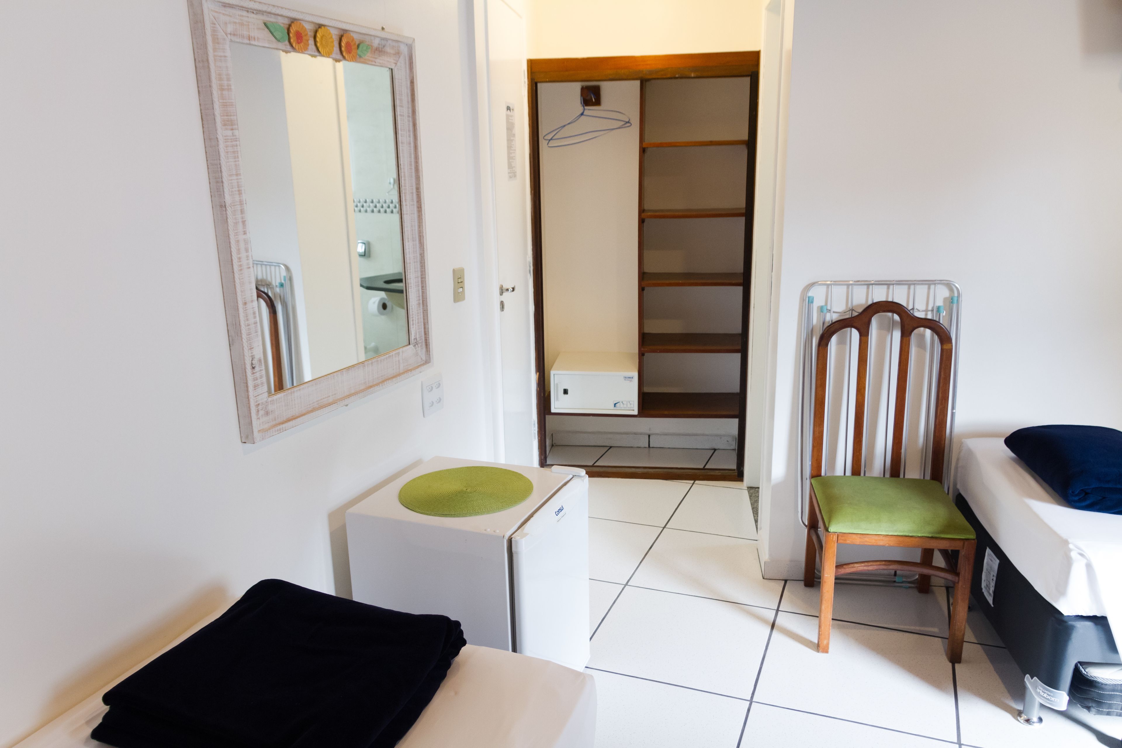 economy quadruple room | minibar, in-room safe, individually decorated, blackout curtains