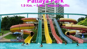 Pattaya Park with multiple water slides and a swimming pool. - T5 Suites at Pattaya (Pattaya)
