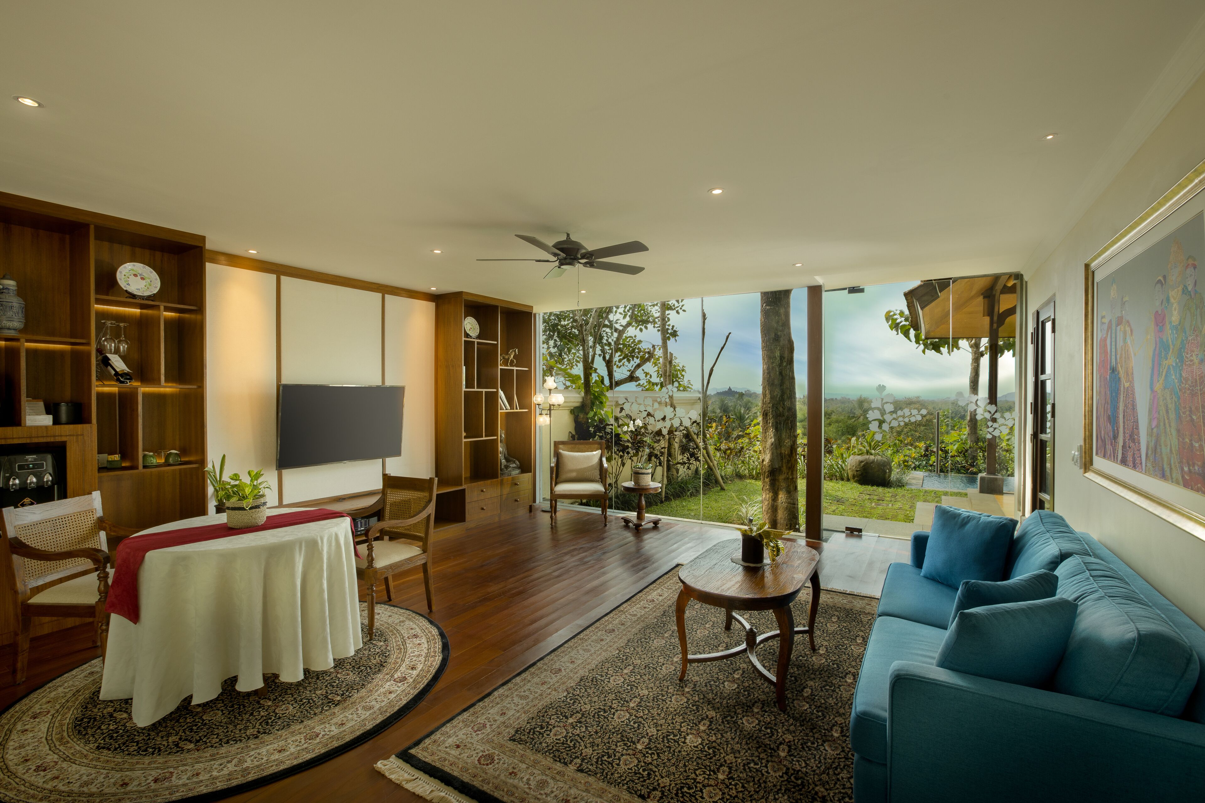 borobudur view pool villa | living area | 32-inch lcd tv with cable channels, tv, dvd player