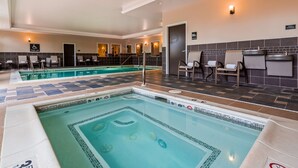 A hotel pool area with multiple pools, lounge chairs, and a pool lift. - Best Western Plus Easton Inn & Suites (Easton)