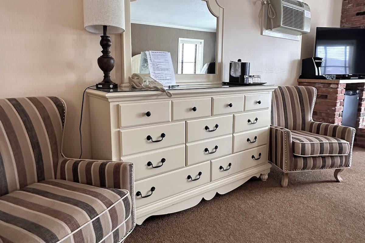 Deluxe Double Queen - Fireplace | Premium bedding, pillowtop beds, individually decorated