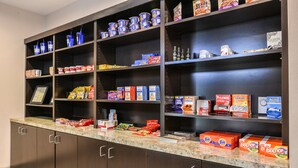A self-service food station with various food items and condiments. - Holiday Inn Express & Suites Emporia Northwest by IHG (Emporia)