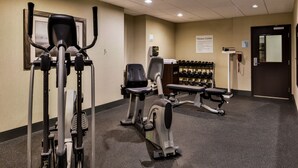 A fitness center with cardio machines, free weights, and a bench. - Holiday Inn Express & Suites Emporia Northwest by IHG (Emporia)