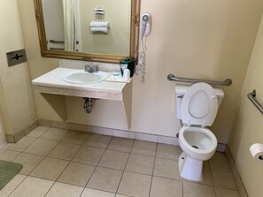 Combined shower/bathtub, rainfall showerhead, towels, soap