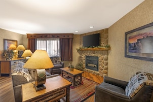Suite, 1 King Bed, Non Smoking, Fireplace (with Sofabed) | Pillowtop beds, desk, blackout drapes, iron/ironing board