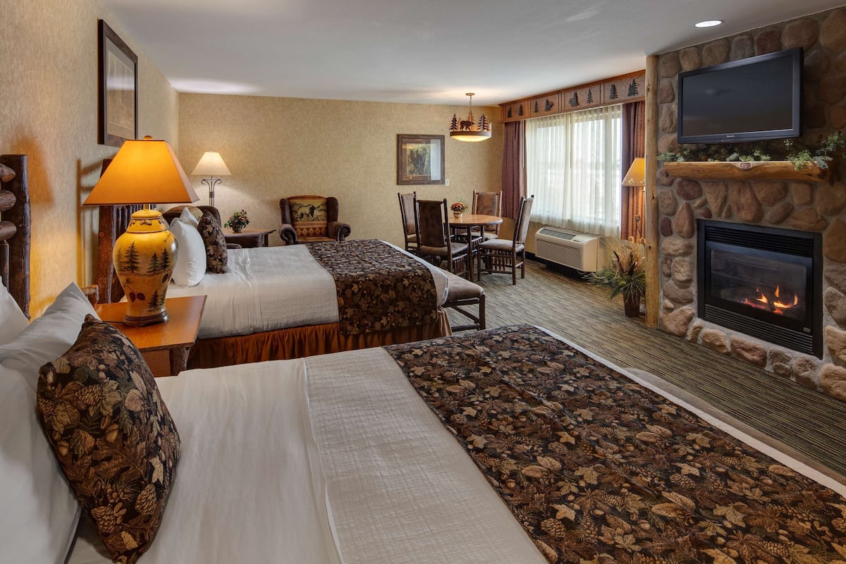 standard room, 2 queen beds, non smoking, jetted tub | pillow-top beds, desk, blackout curtains, iron/ironing board