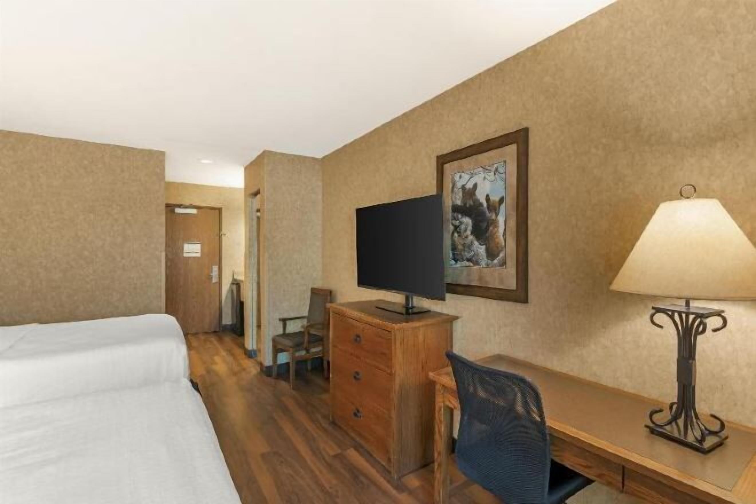 Pillowtop beds, desk, blackout drapes, iron/ironing board