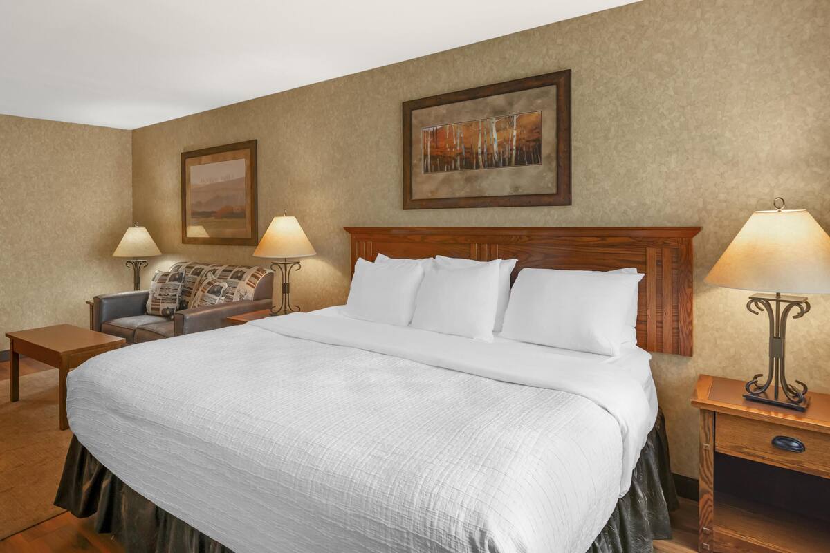 Pillowtop beds, desk, blackout drapes, iron/ironing board