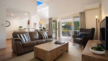 Apartemen, 3 kamar tidur | Area keluarga | TV layar datar dan pemutar DVD