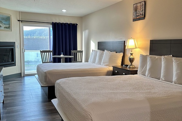 Suite, 2 Queen Beds, Balcony, Partial Ocean View | 1 bedroom, in-room safe, individually decorated, individually furnished