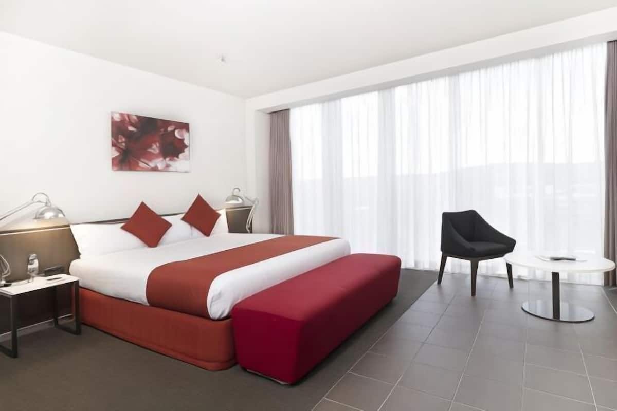 Premium bedding, blackout drapes, iron/ironing board, free WiFi