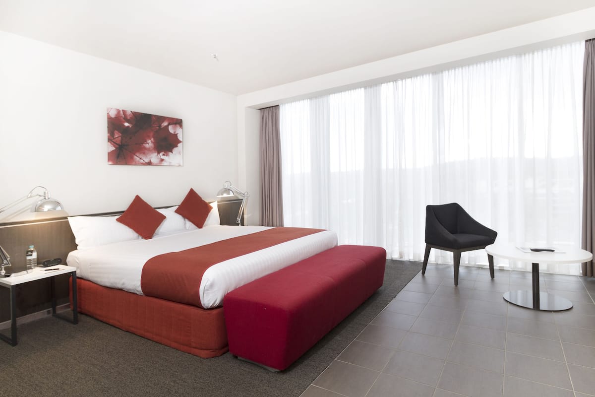 Premium bedding, blackout drapes, iron/ironing board, free WiFi