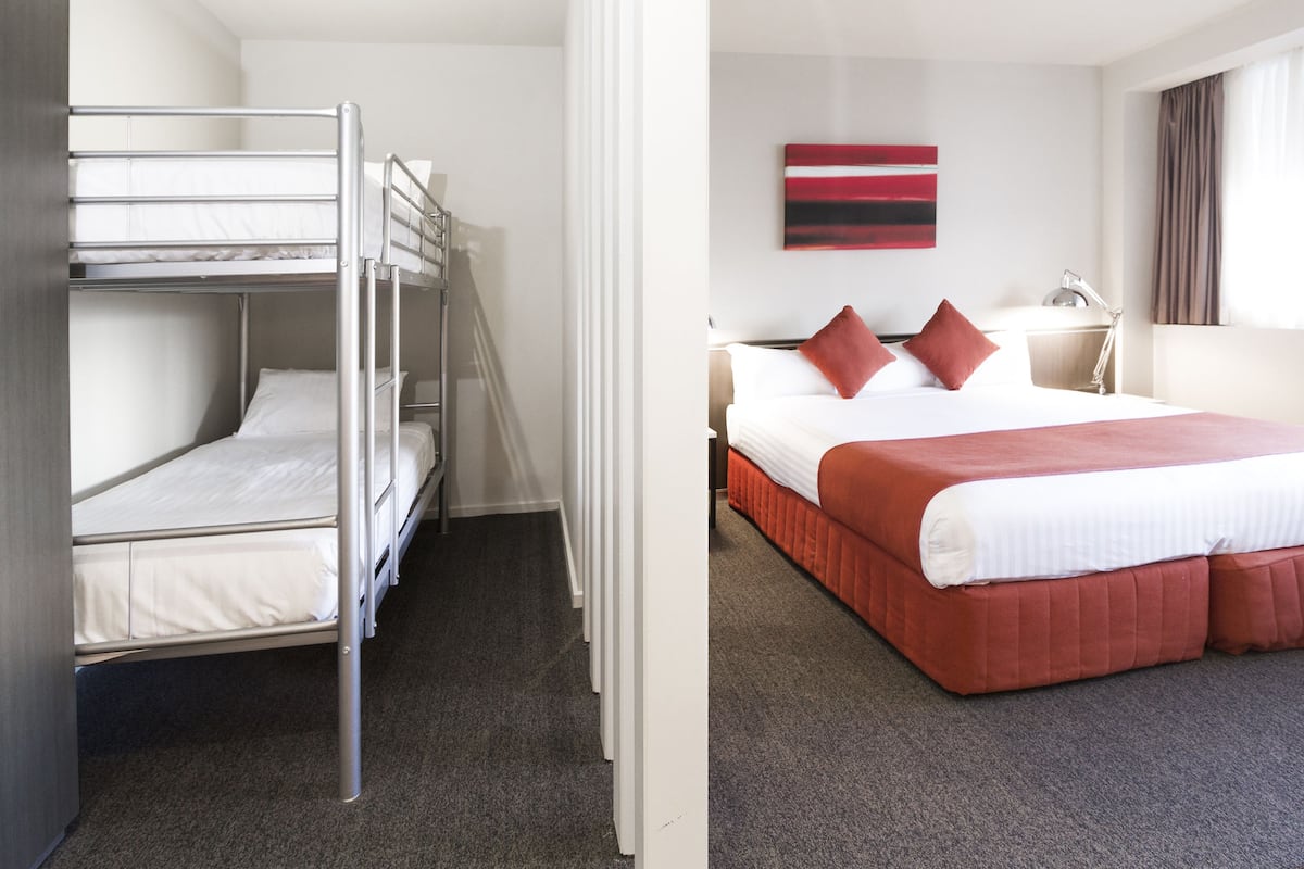Premium bedding, blackout drapes, iron/ironing board, free WiFi