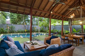 One bedroom pool villa (Gecko) | Living area | Flat-screen TV