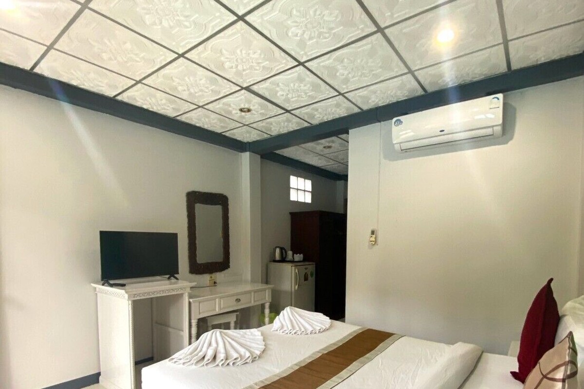 Pool View King | 1 bedroom, minibar (some free items), in-room safe, desk