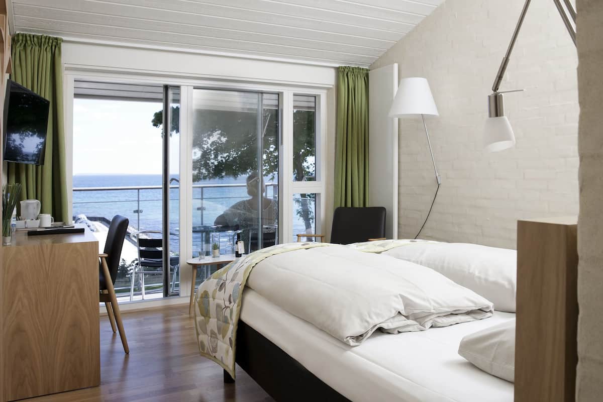 seaside room with balcony and seaview | hypo-allergenic bedding, blackout curtains, soundproofing