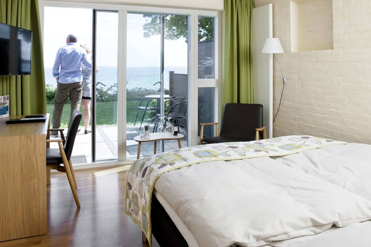 seaside room with balcony and seaview | hypo-allergenic bedding, blackout curtains, soundproofing