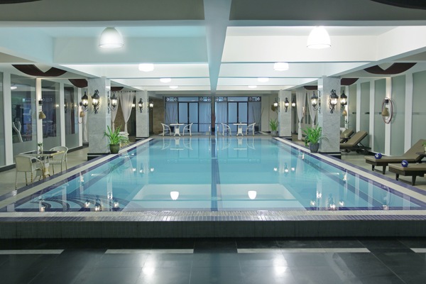 Indoor pool, seasonal outdoor pool, pool umbrellas, sun loungers