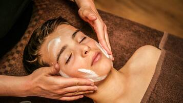A person receiving a facial treatment.