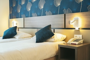 Ropa de cama de alta calidad y minibar 