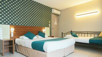 Superior Quadruple Room | Premium bedding, minibar, in-room safe, desk