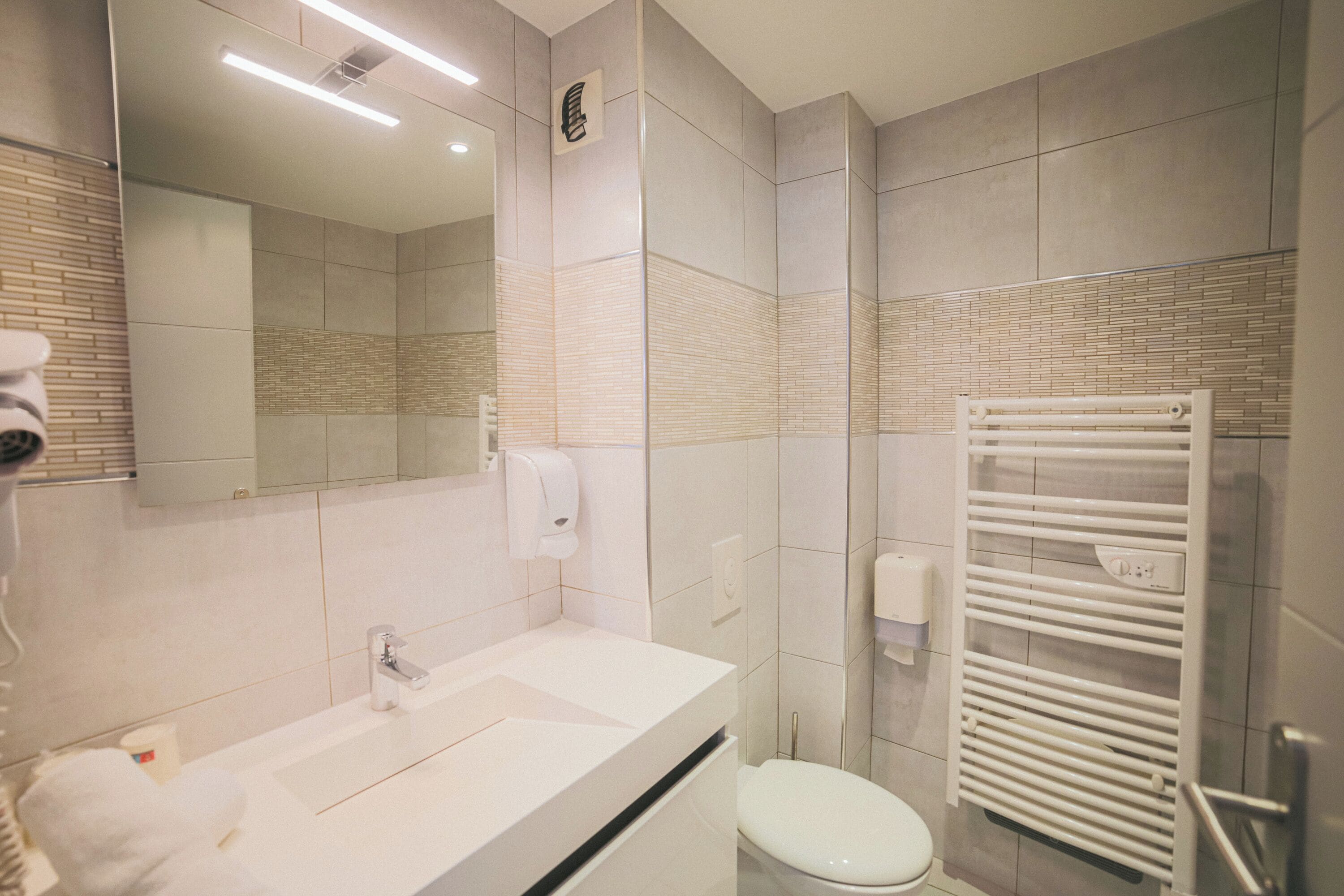 standard triple room | bathroom | rainfall showerhead, hair dryer