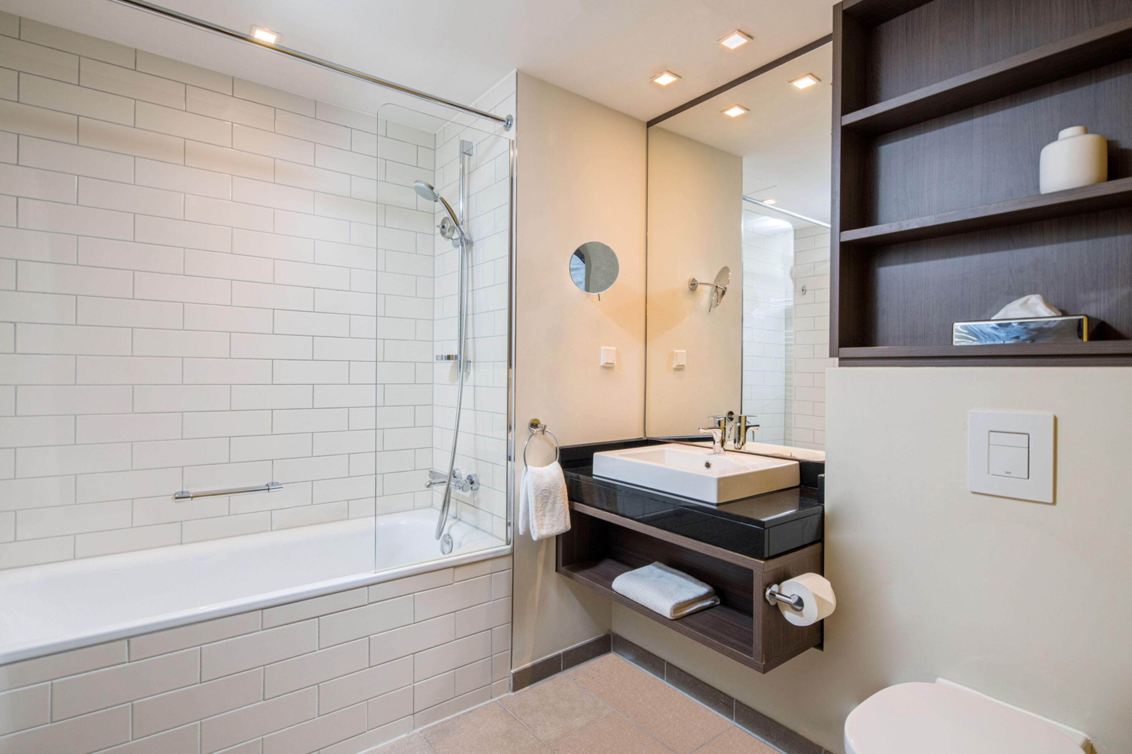 deep-soaking bathtub, eco-friendly toiletries, hair dryer, towels