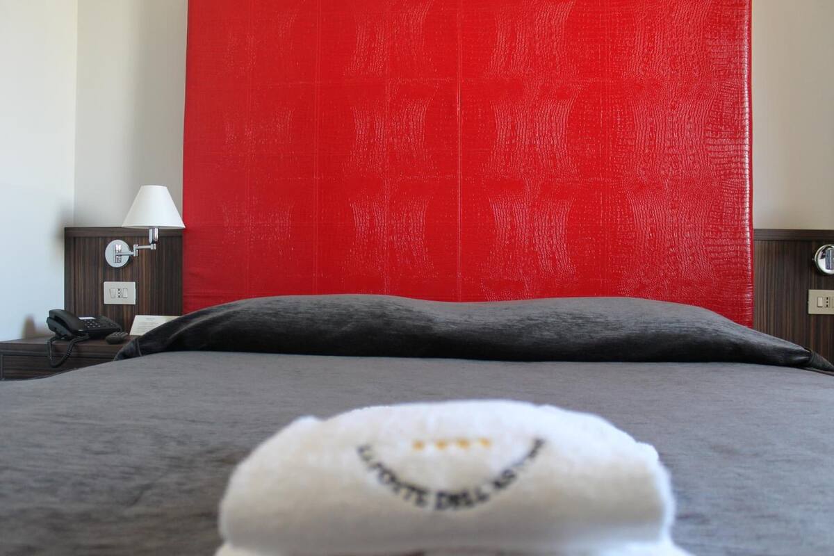 minibar, desk, blackout curtains, iron/ironing board