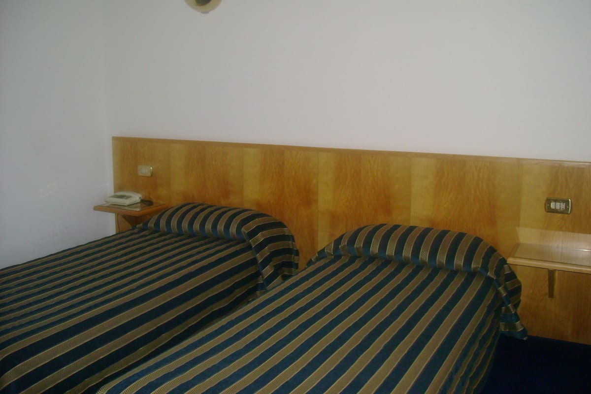 Double Room Single Use | Minibar, desk, blackout drapes, iron/ironing board