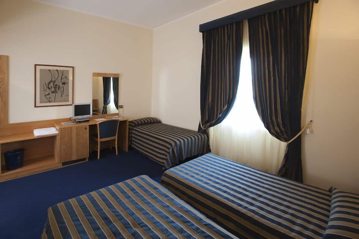 Standard Triple Room | Minibar, desk, blackout drapes, iron/ironing board
