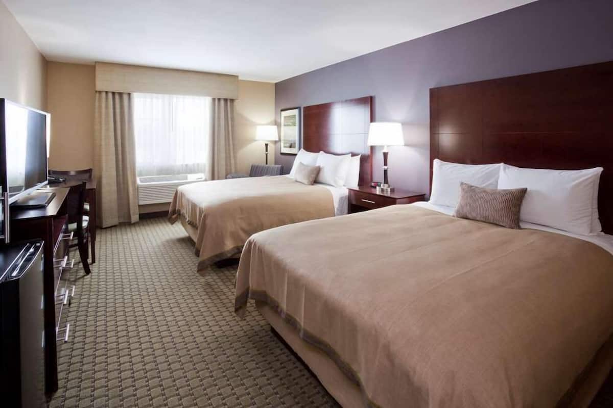 Premium bedding, desk, blackout drapes, iron/ironing board