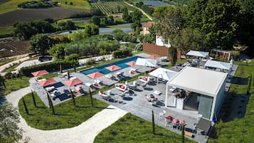 2 outdoor pools, pool umbrellas, pool loungers
