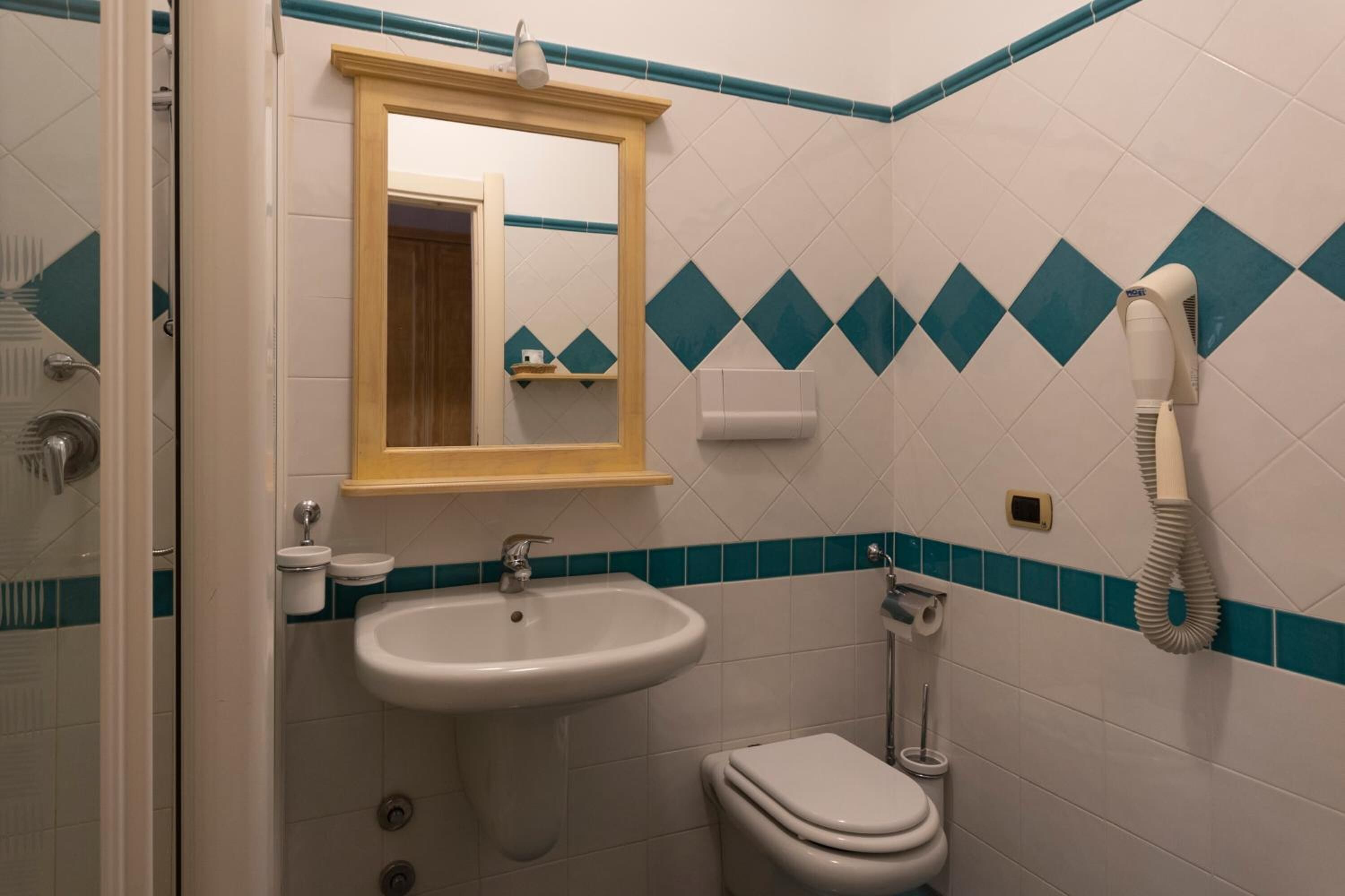 shower, free toiletries, hair dryer, bathrobes