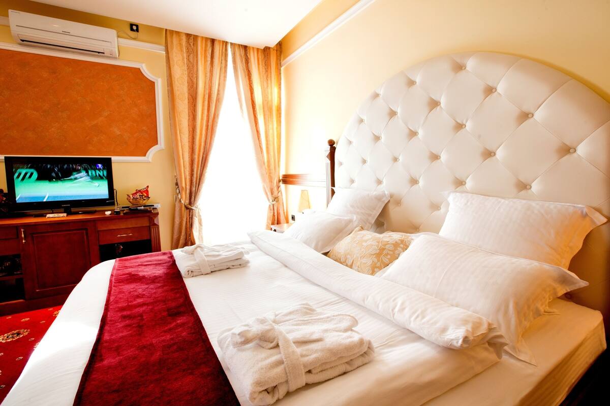 Suite Comfort | Minibar, meja kerja, tirai kedap cahaya, dan setrika/meja setrika